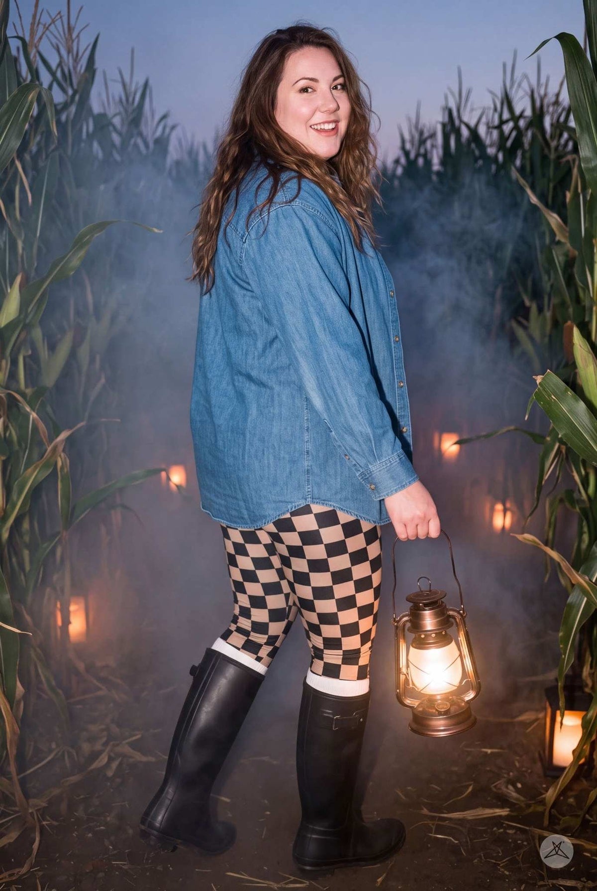 SweetLegs Check Yourself Leggings modeled in black and tan checkered high waisted leggings in a cornfield