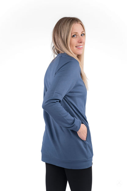 Woman wearing blue Basic Raglan Pullover (Copy) by SweetLegs Canada with long sleeves and relaxed fit side view