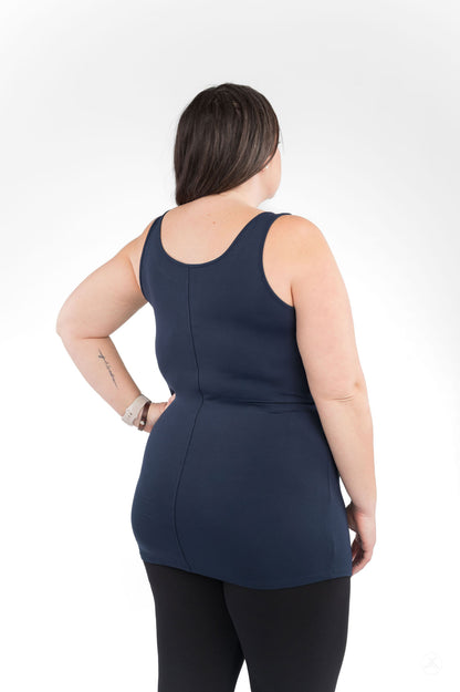 Woman wearing navy Classic Layering Tank Copy by SweetLegs Canada shown from the back with black leggings on white background