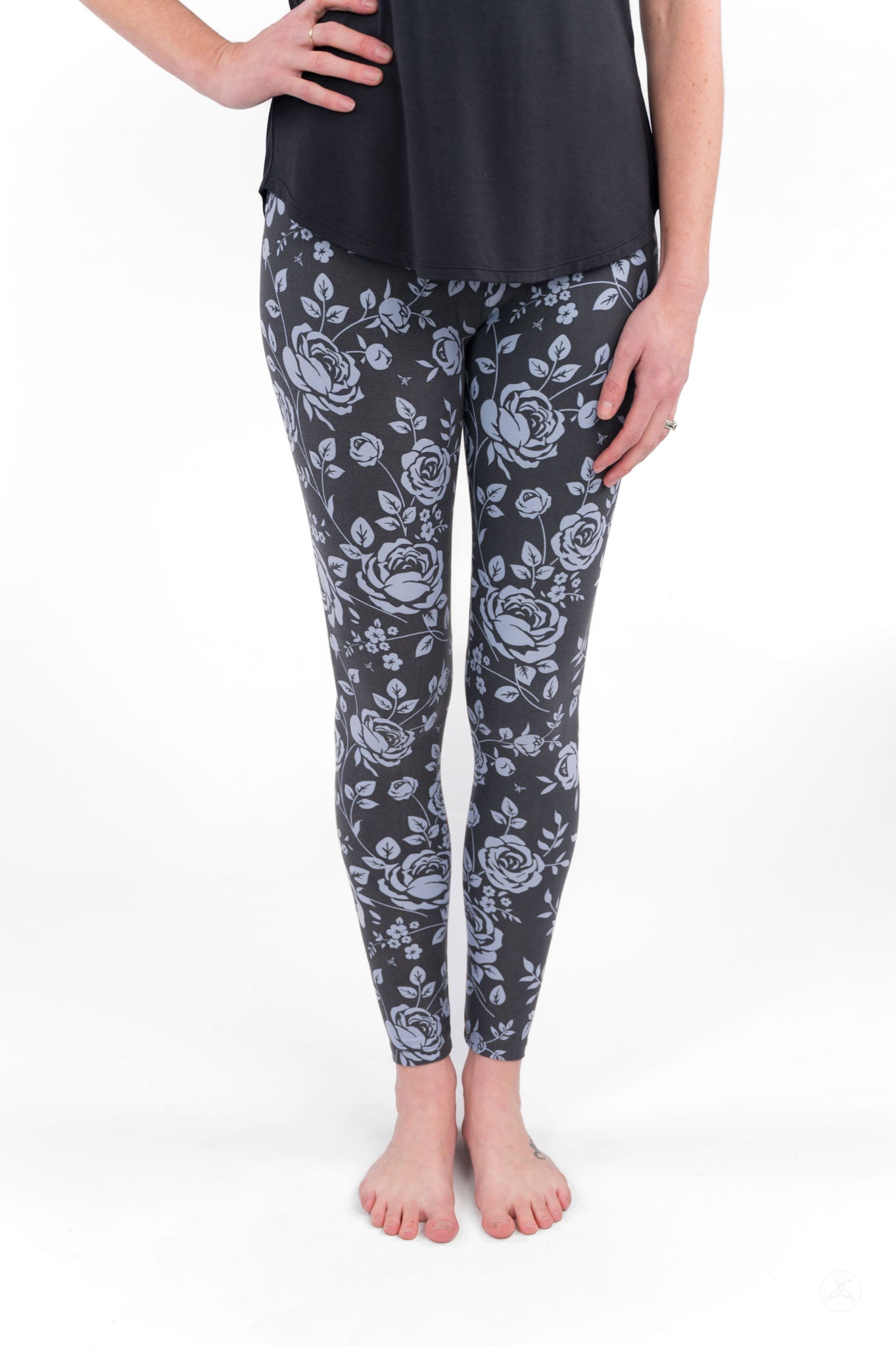 Shadow Garden leggings by SweetLegs featuring soft grey-blue floral print on a dark, moody background.