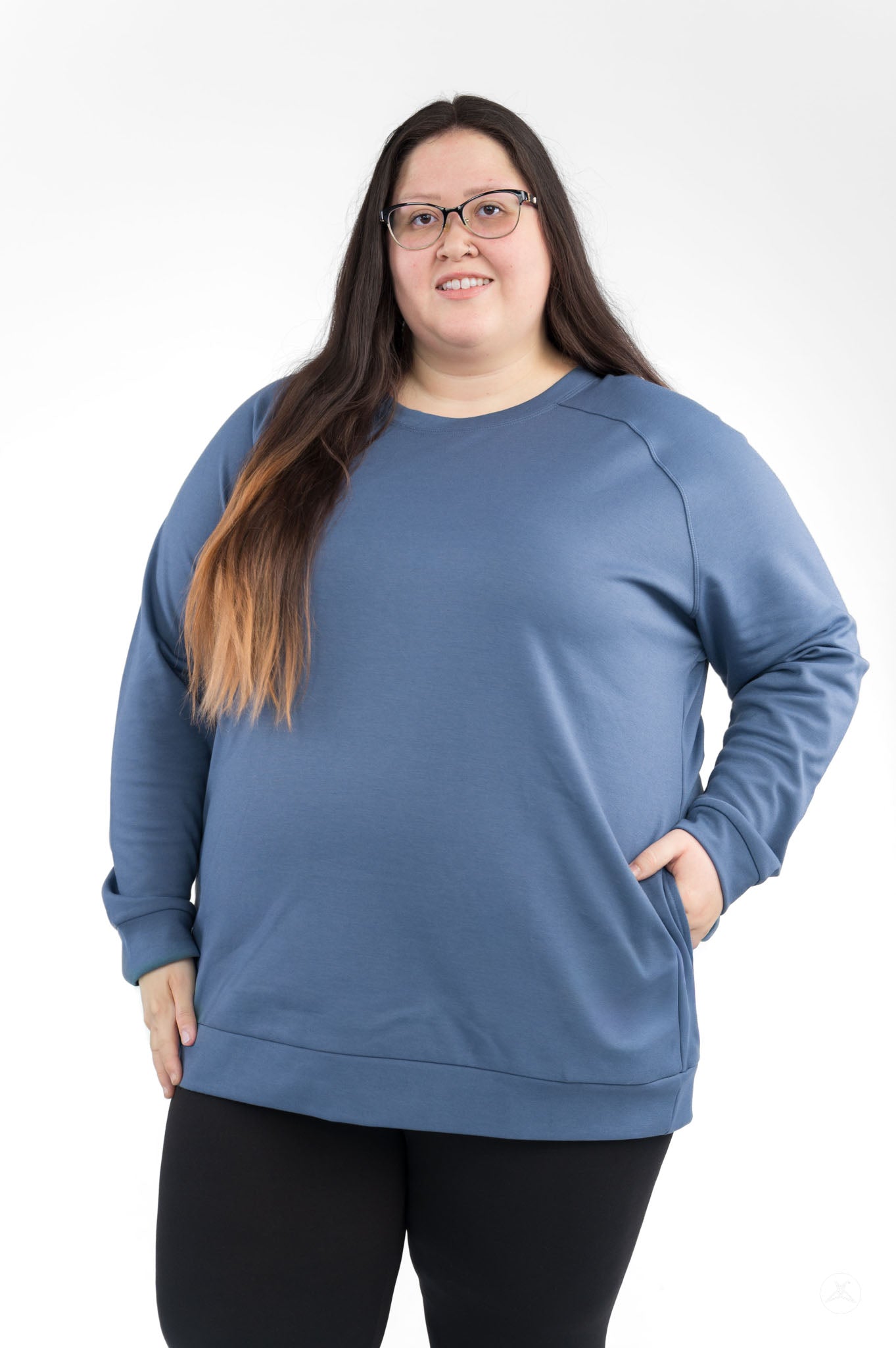 Plus size model wearing a blue Basic Raglan Pullover (Copy) from SweetLegs Canada in a relaxed fit style