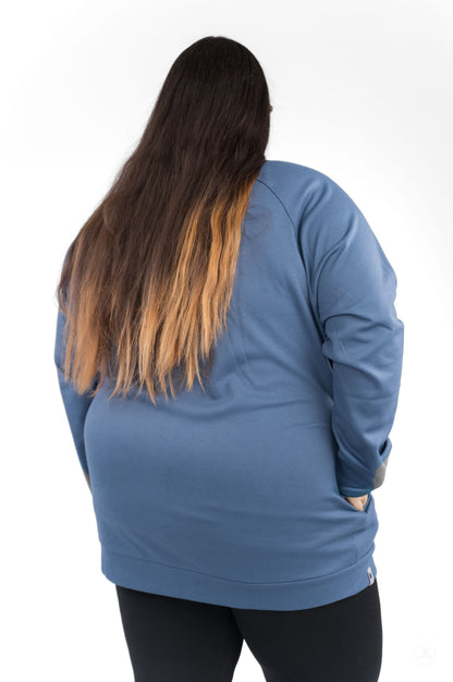 Back view of a person wearing Basic Raglan Pullover (Copy) by SweetLegs Canada in a relaxed blue fit