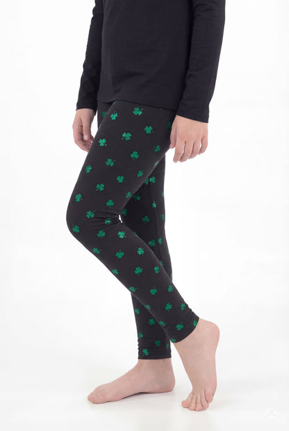 Lucky Glow Kids leggings by SweetLegs featuring bright emerald shamrocks on a soft black stretchy fabric for kids.