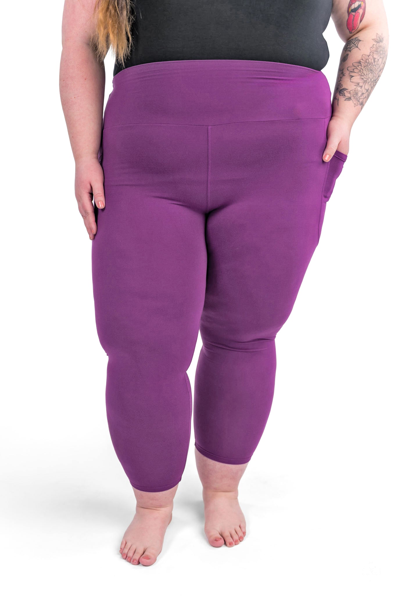 Plus size model wearing sweetlegs Deep Plum High-Waisted Pocket Crops with side pocket on white background
