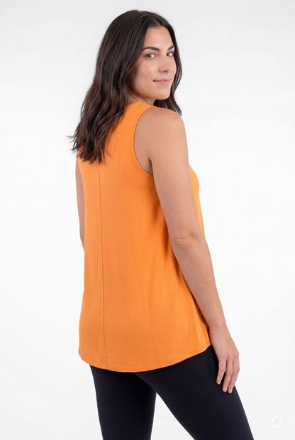 Woman wearing bright orange sleeveless High Neck Tank by sweettops, shown from back with dark hair and black leggings